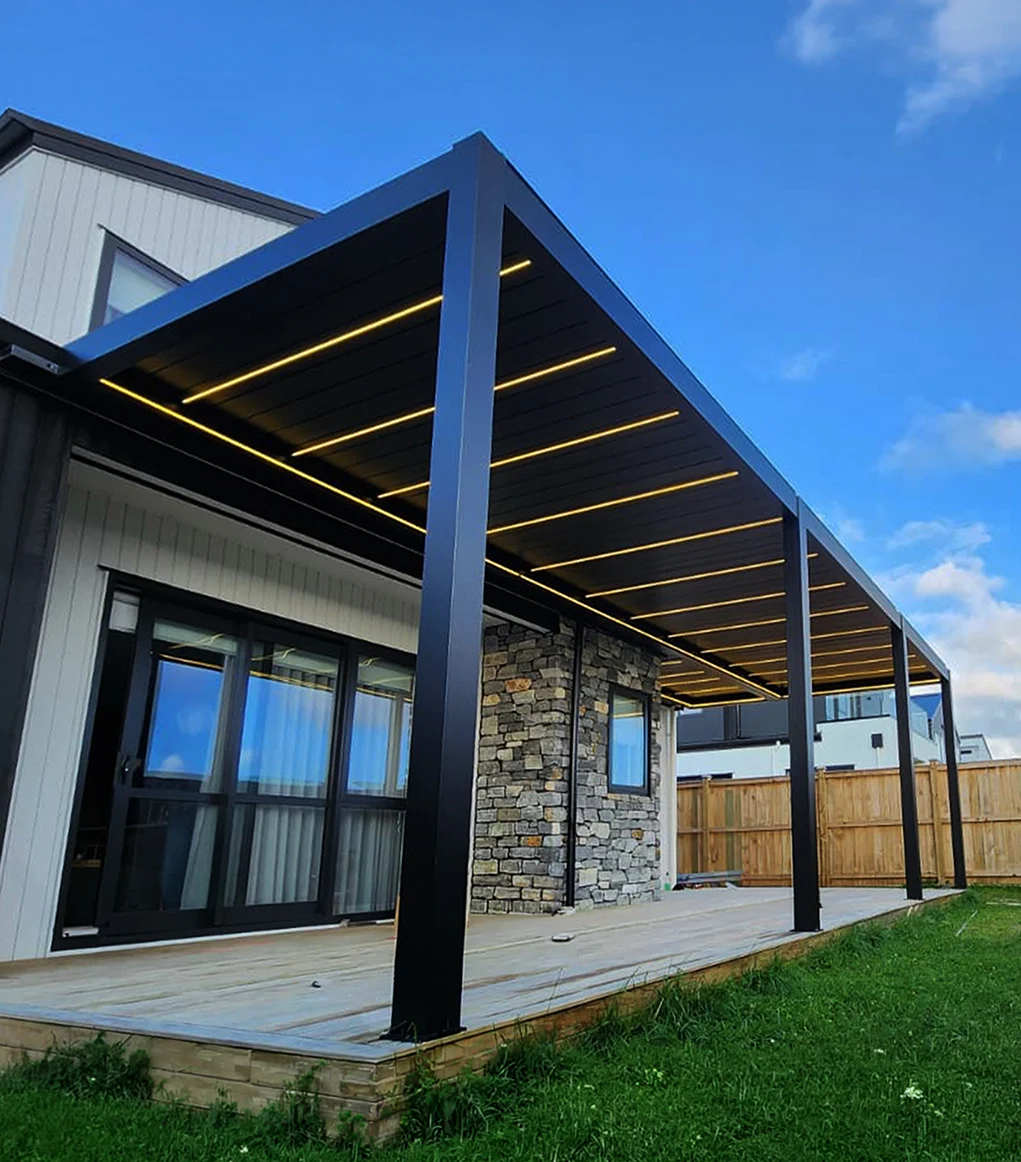 Craftshed Breezy Louvre system installed for natural ventilation over a backyard deck.
