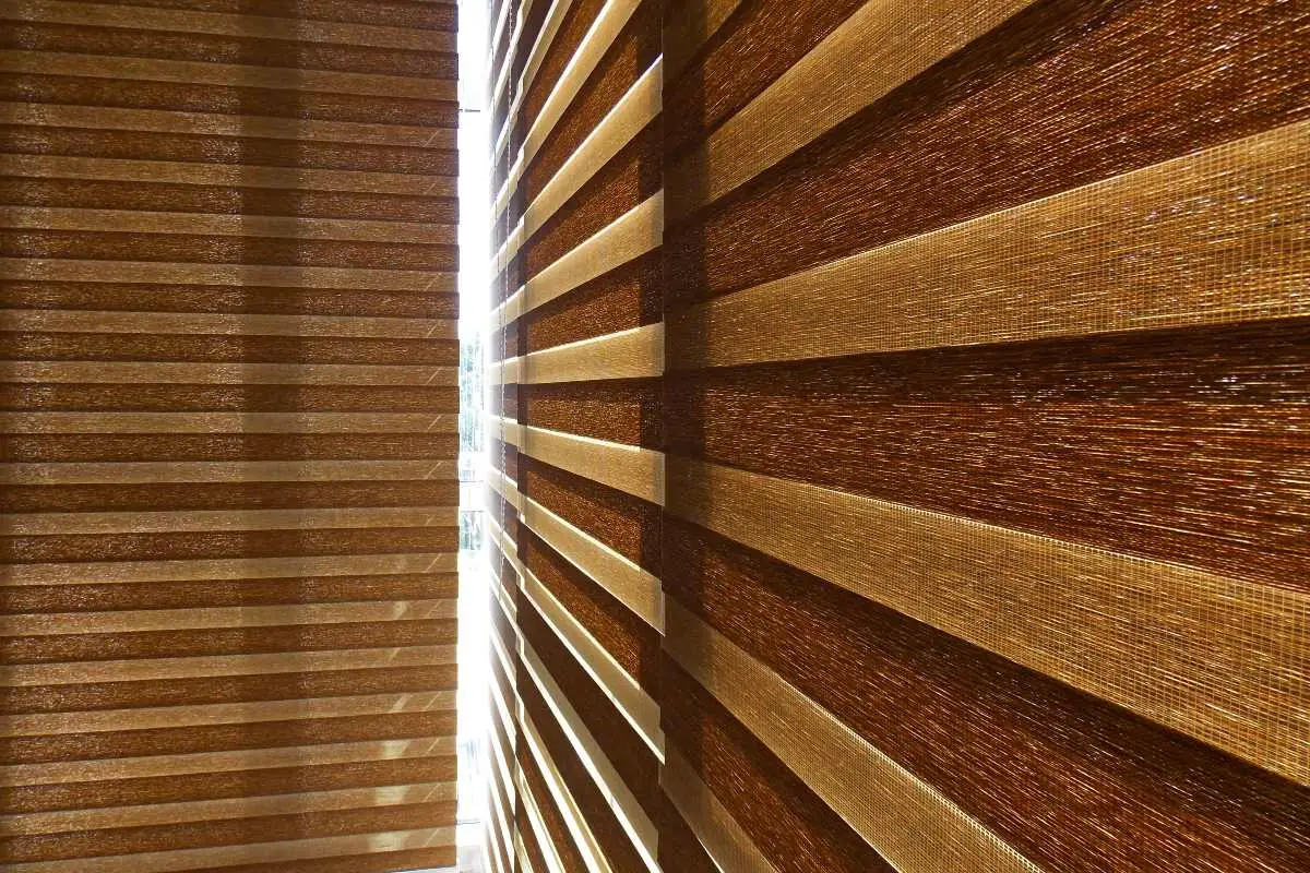 Custom zebra blinds with alternating sheer and solid horizontal fabric panels.
