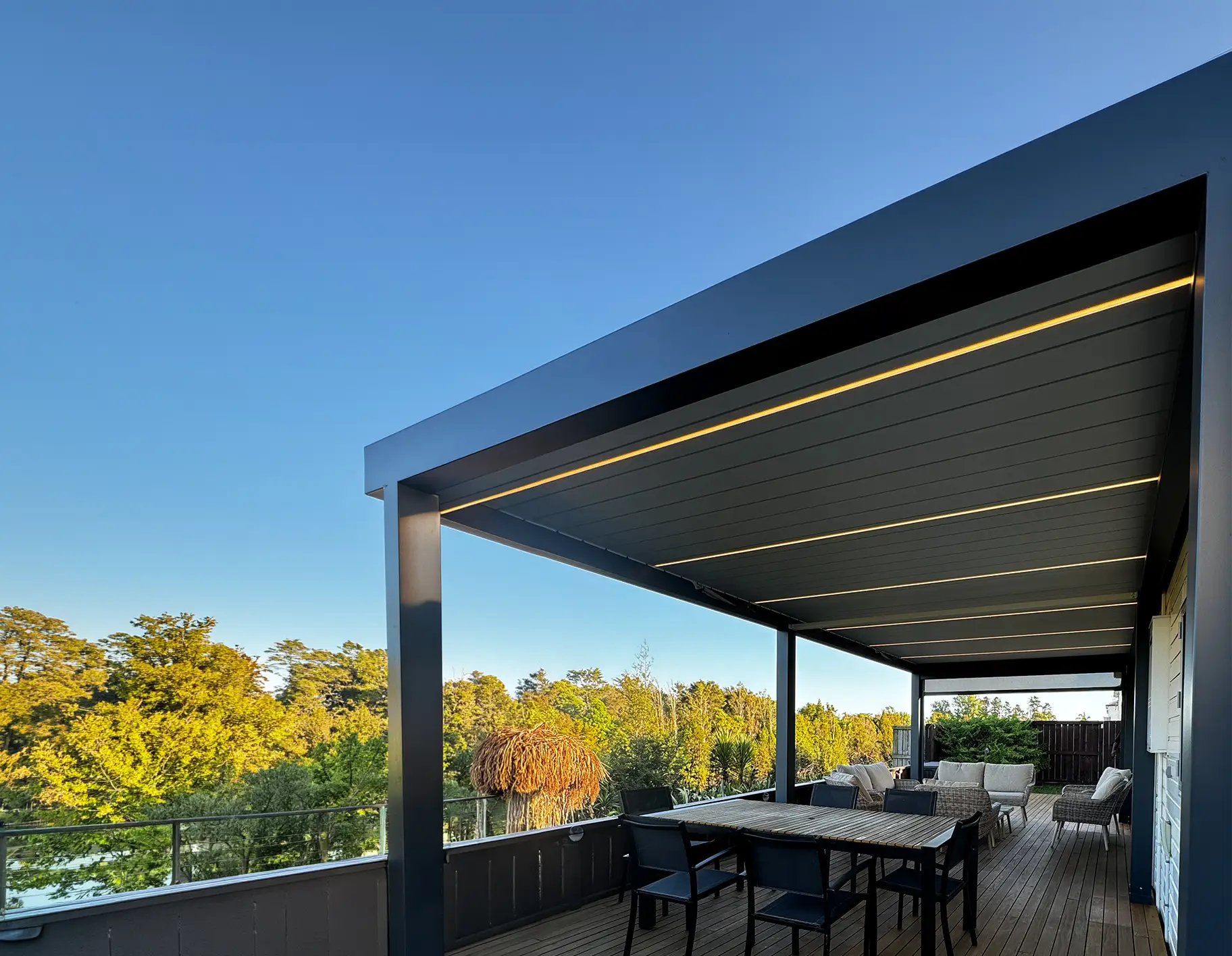 Craft Shed Aqua Louvre opening roof pergola system installed on a modern home patio.